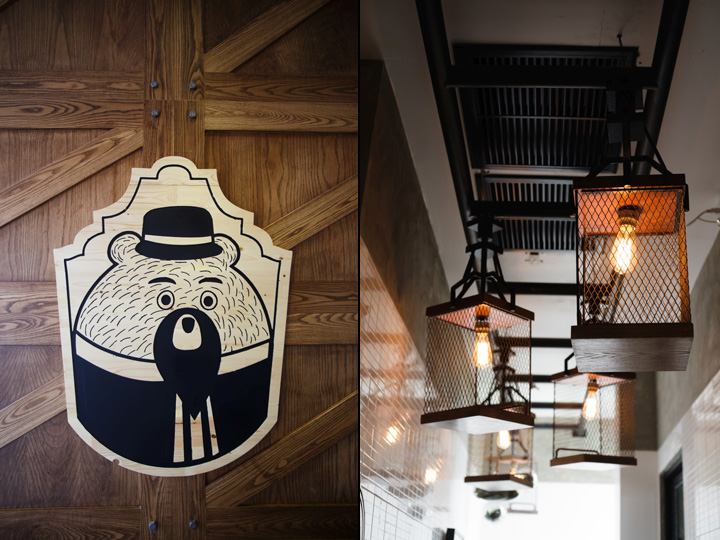 Логотип и подвесные лампы в ресторане