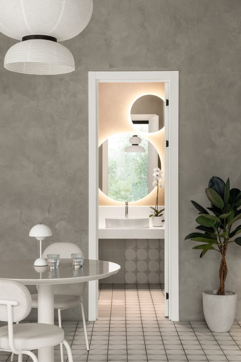 Зона санузла кофейни Light and airy coffee house in the Astana